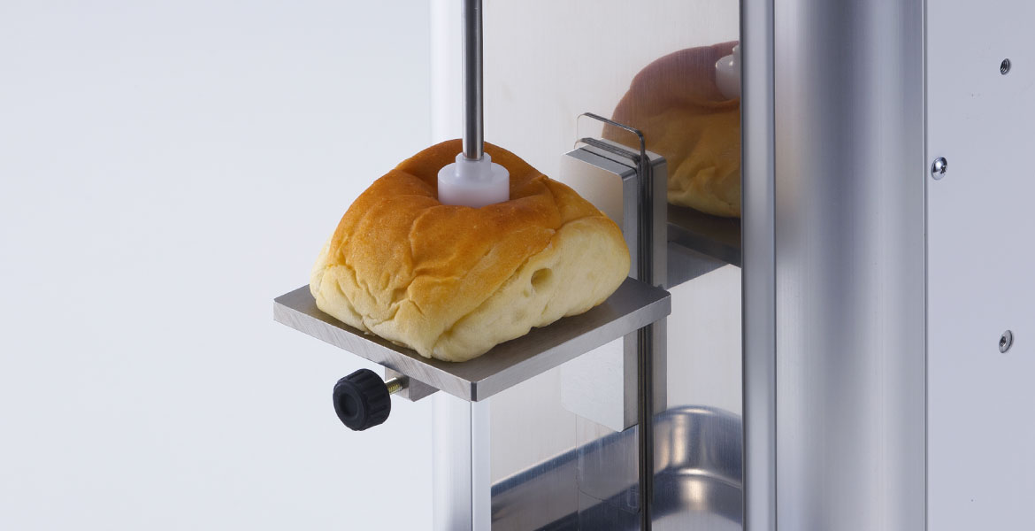 Sistema per effettuare il test di masticazione TPA (Texture Profile Analysis) su pane e prodotti da forno